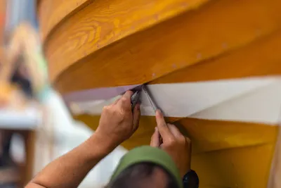 Students work with instructors at the Northwest School of Wooden Boatbuilding, in Port Townsend, Washington on July 25, 2023. The NSWB has been in operation of over 40 years, teaching students wooden boatbuilding skills and helping launch careers in that industry.